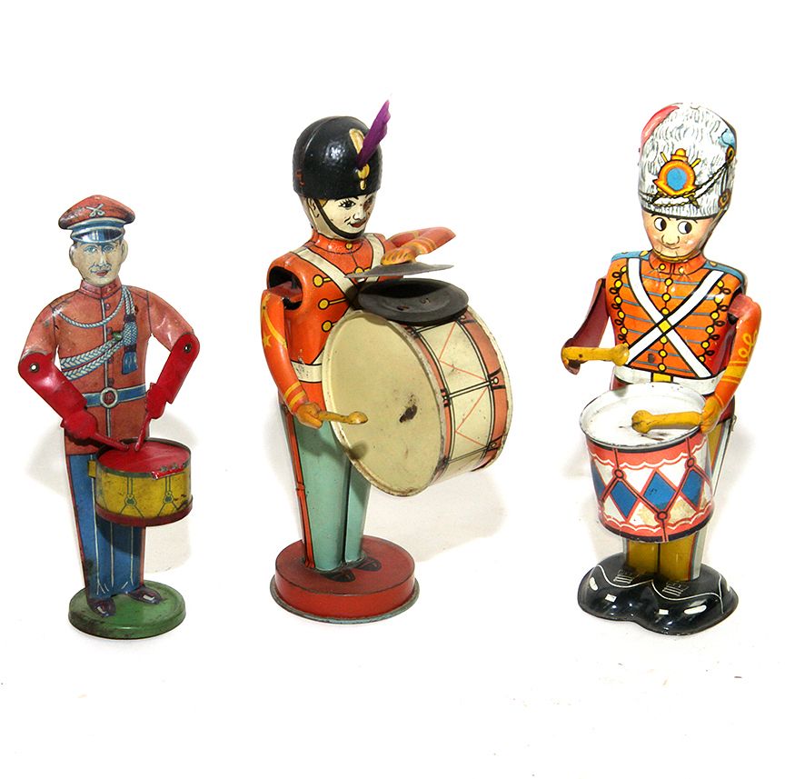 Appraisal: Tin Toy Lot A three piece tin drummer lot with