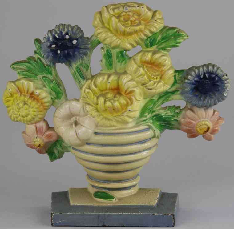 Appraisal: MARIGOLDS DOORSTOP Hubley '' '' flowers in white vase w