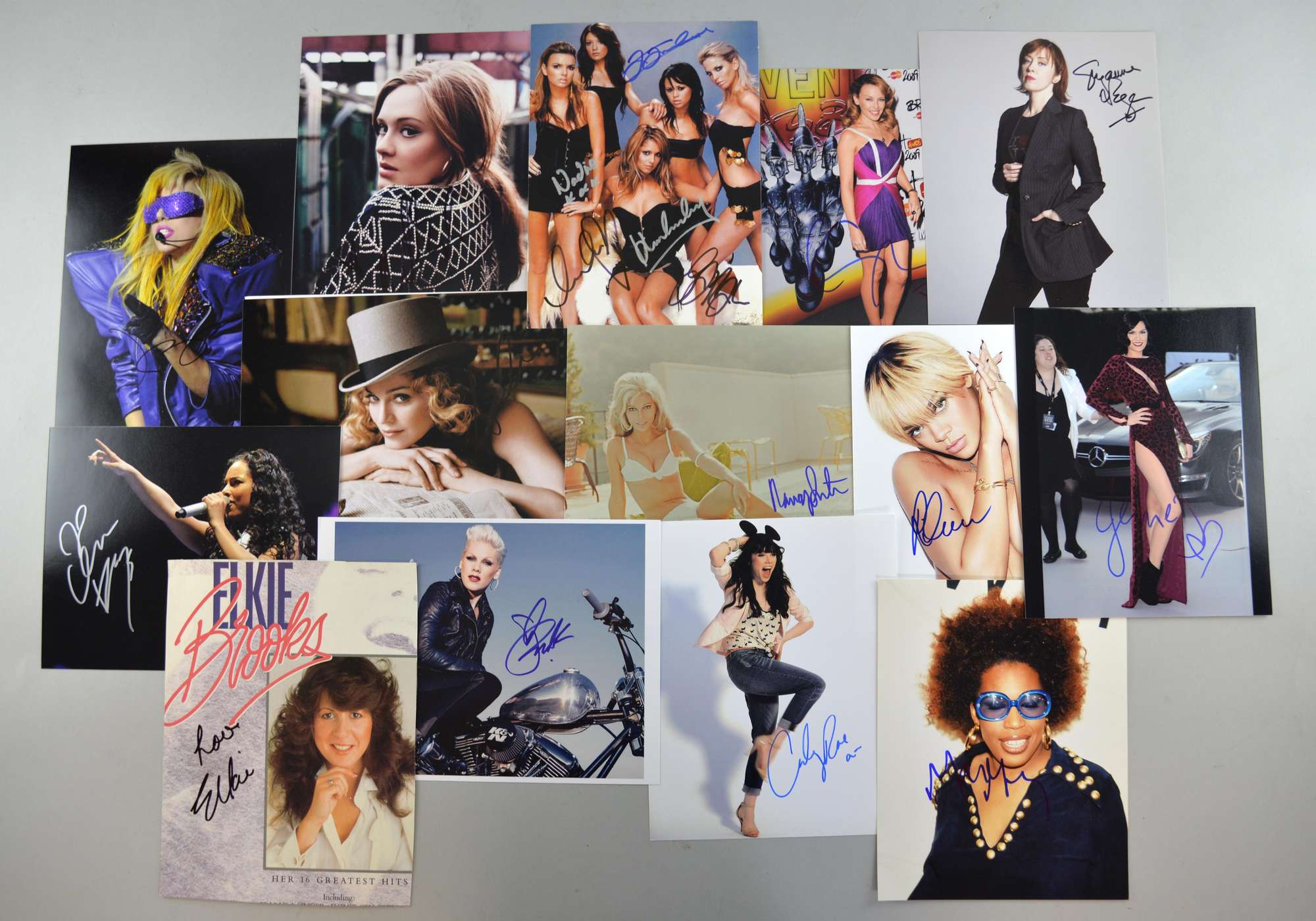 Appraisal: Fourteen signed photos of female artists including Madonna Adele Lady