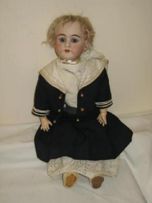 Appraisal: A DEP bisque head girl doll with blue glass sleeping