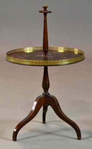 Appraisal: Mahogany And Brass Butler's TableRaised on three scrolled surrports with