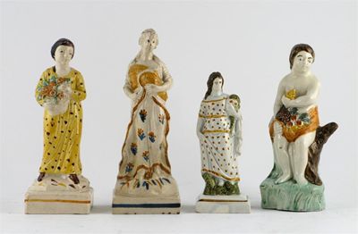 Appraisal: Four Prattware figures all probably emblematic of Summer or the