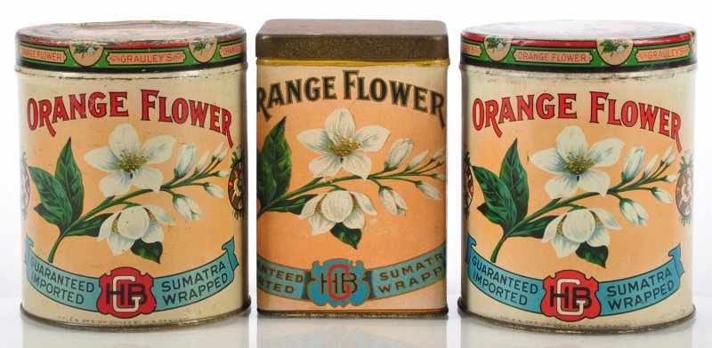 Appraisal: Lot of Orange Flower Cigar Tins Description Three colorful hard