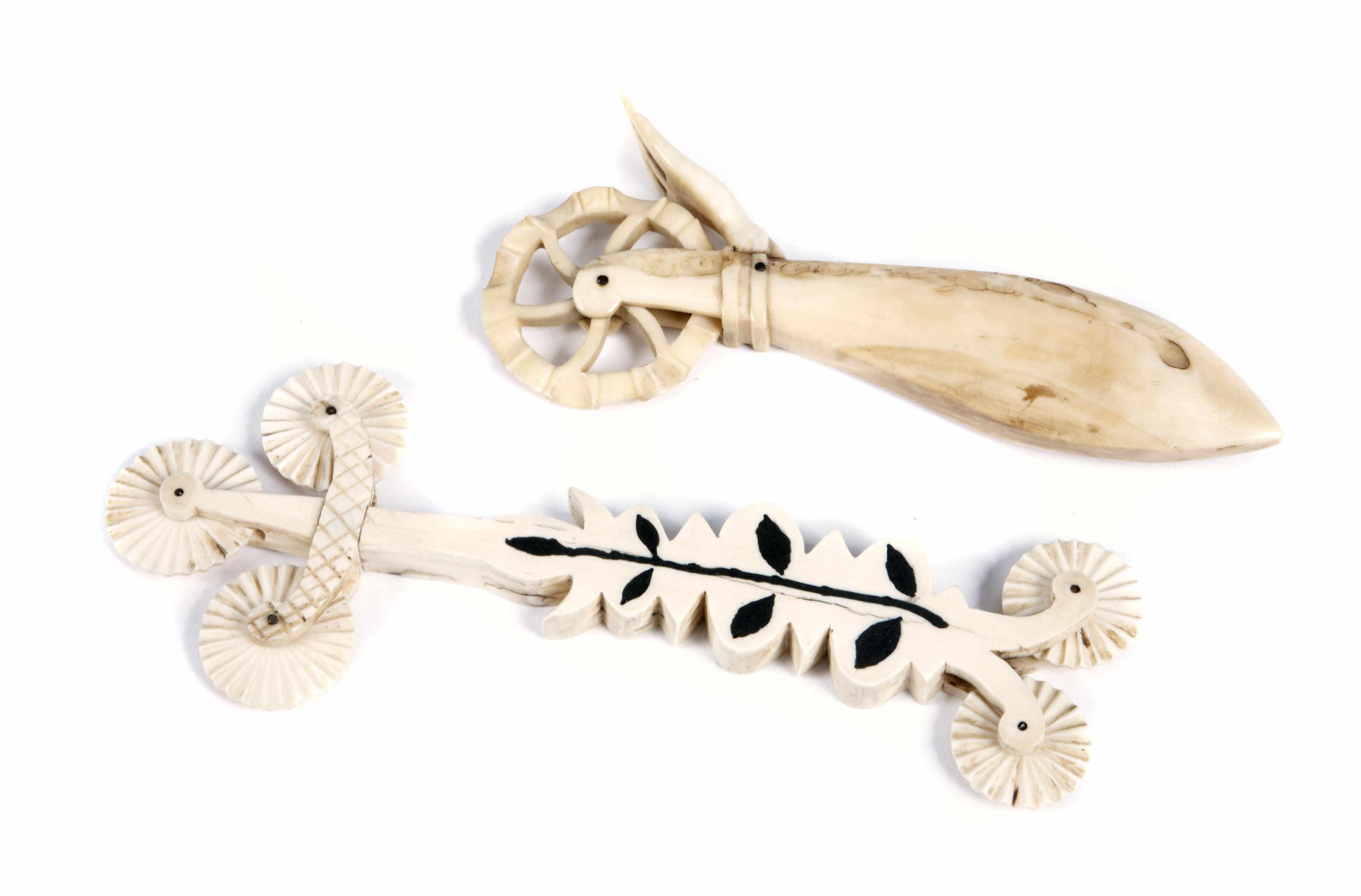 Appraisal: A group of two ivory jagging wheels th centurylength in