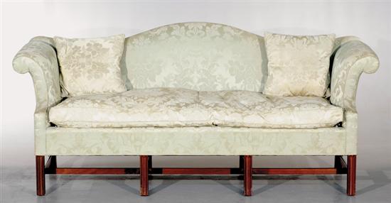 Appraisal: Chippendale style camelback sofa by Biggs th century serpentine back