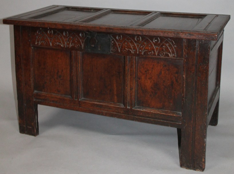 Appraisal: An thC oak three panel coffer the rectangular top hinging