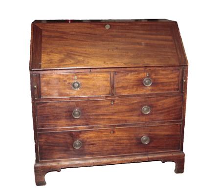 Appraisal: A George III mahogany bureau the fall front revealing a