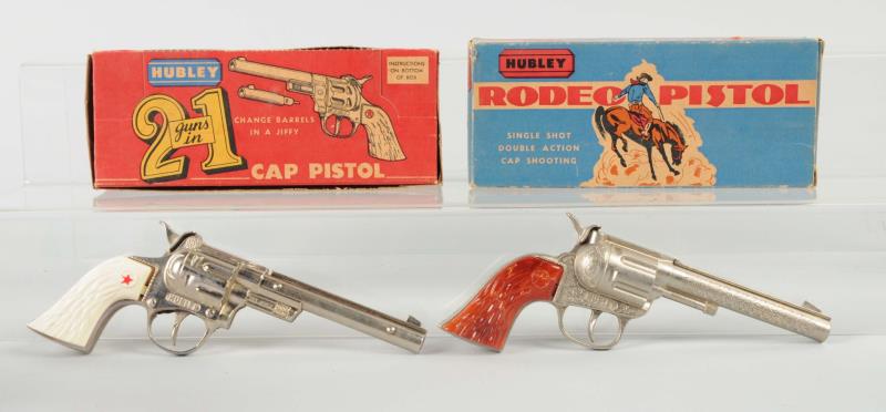 Appraisal: Lot Of Hubley Boxed Toy Guns The rodeo pistol has