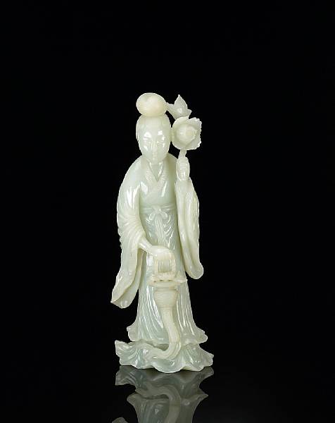 Appraisal: A pale green jade standing beauty th th Century Dressed