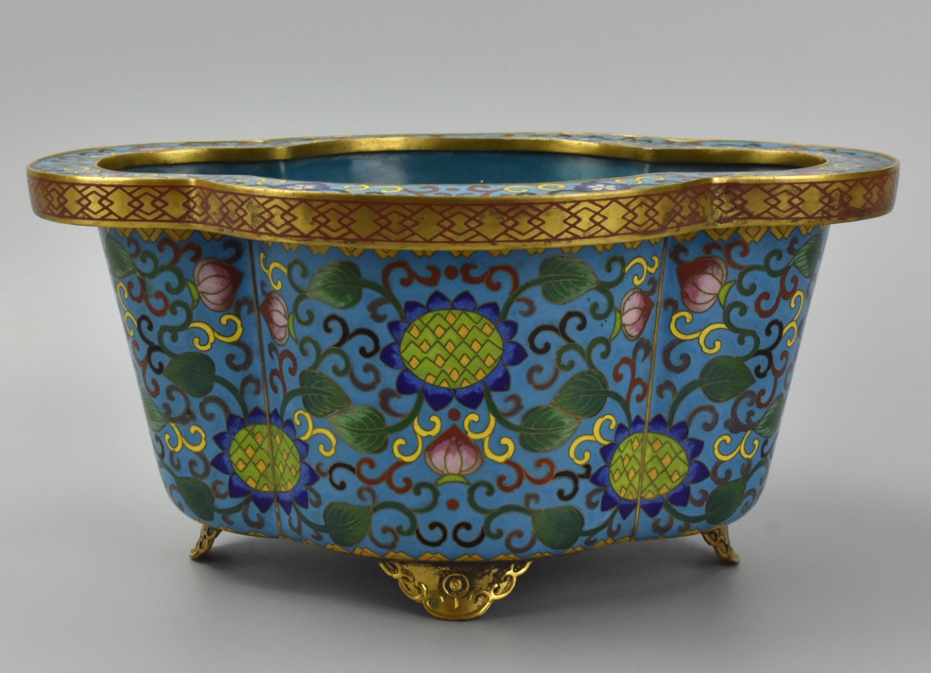 Appraisal: CHINESE FOOTED CLOISONNE QUATREFOIL BASIN TH C A Chinese cloisonne