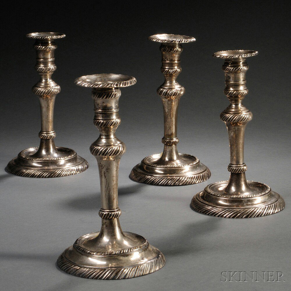 Appraisal: Four Continental Silver Candlesticks th th century with impressed marks