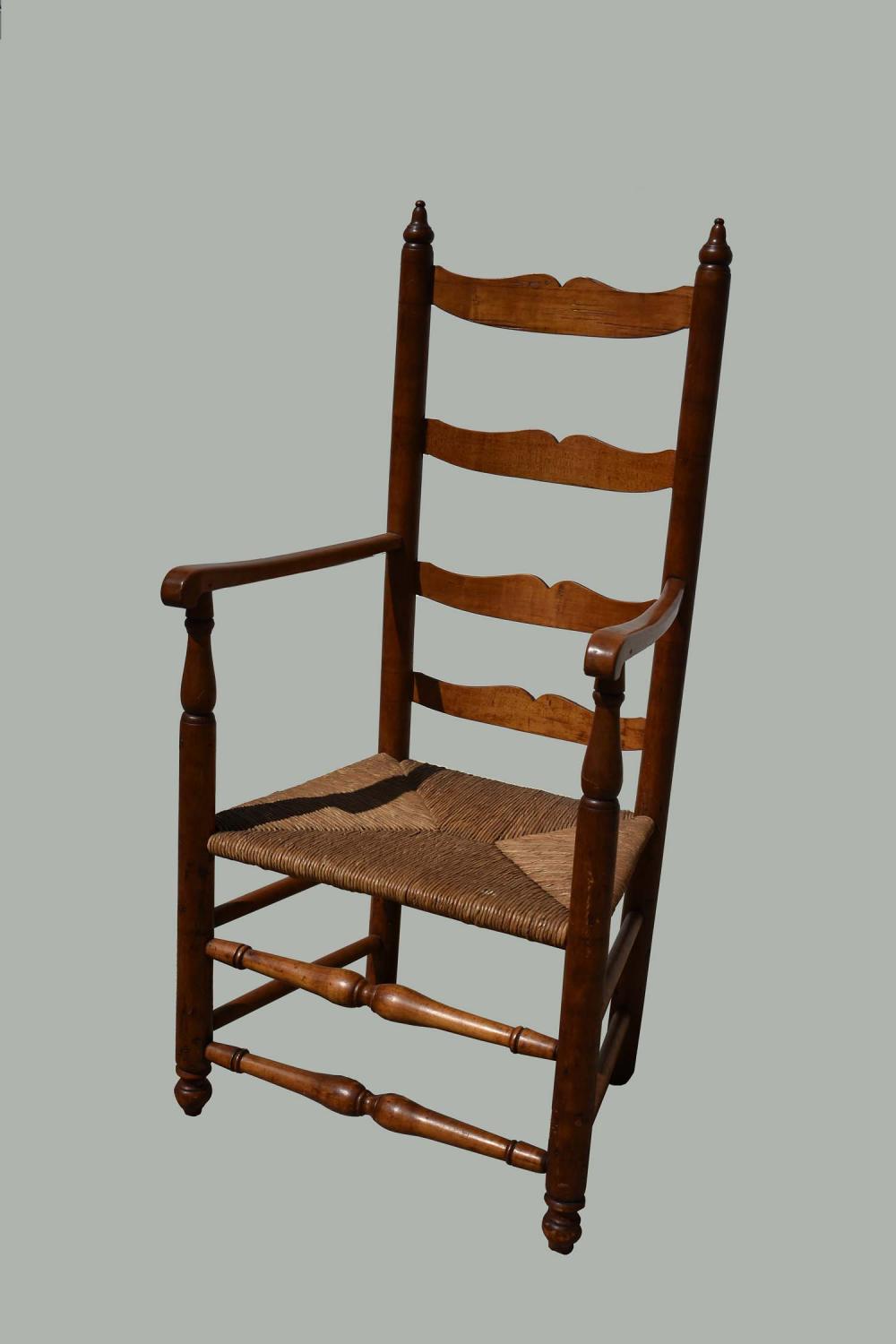 Appraisal: AMERICAN MAPLE ASH LADDER BACK RUSH-SEAT ARMCHAIRNew England First Half