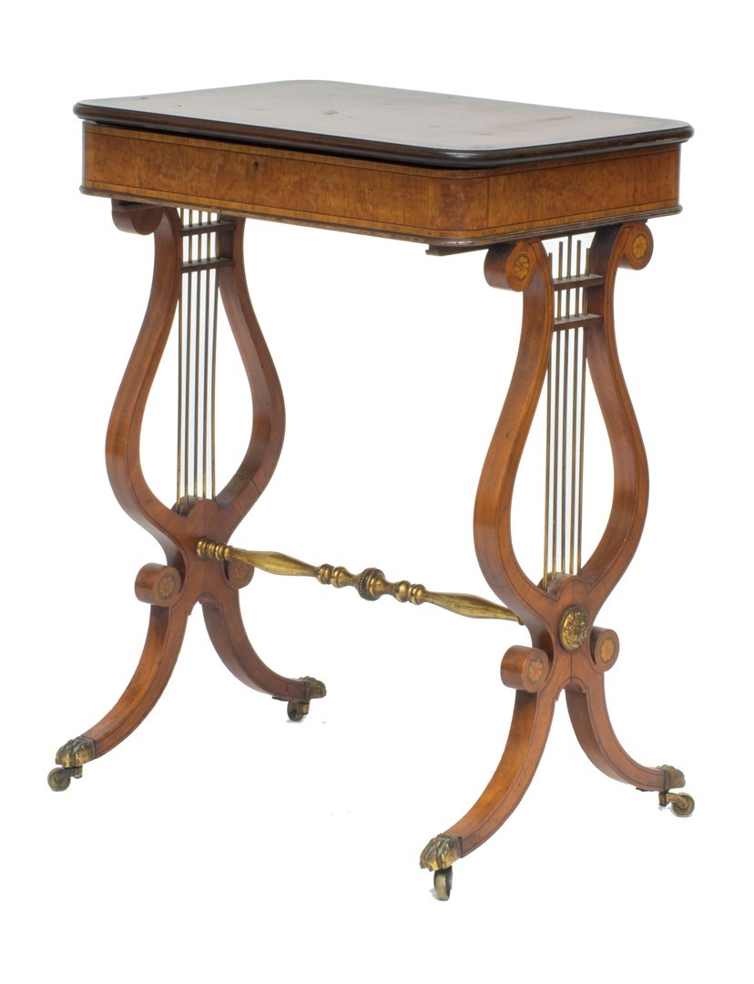 Appraisal: An early th century inlaid satinwood rectangular sewing table on