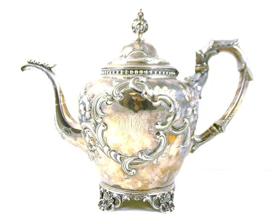 Appraisal: SILVER S C Ewan silver teapot th C floral and