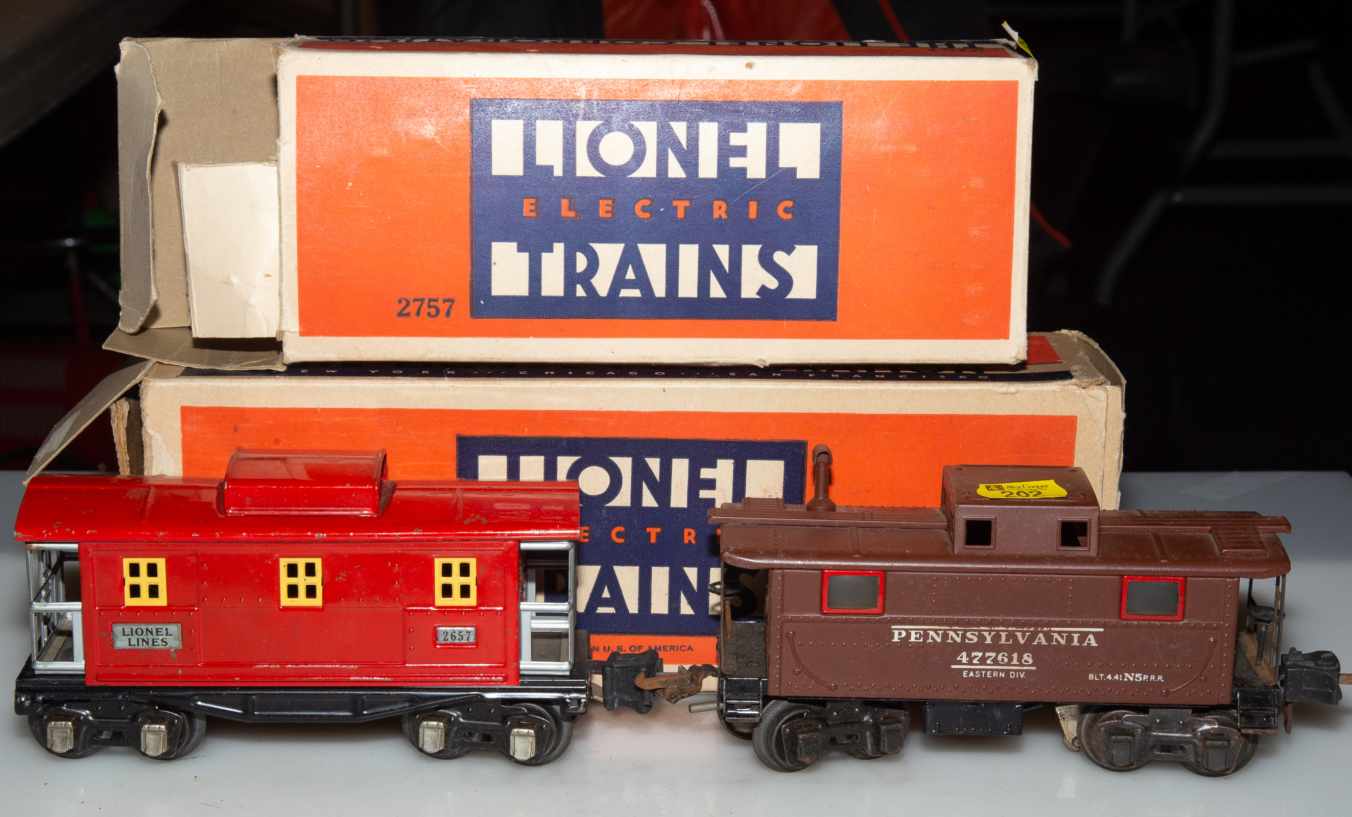 Appraisal: SIX LIONEL FREIGHT CARS Circa s Includes illuminated caboose oil