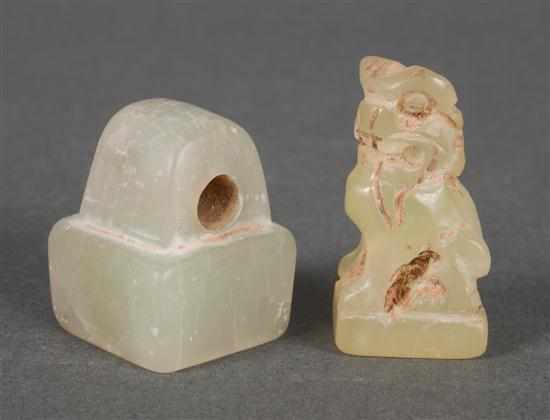 Appraisal: Two carved hardstone seals in the Han manner seated foo