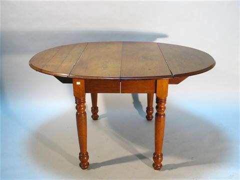 Appraisal: AMERICAN EMPIRE WALNUT DROPLEAF DINING TABLE Circa 's- 's with