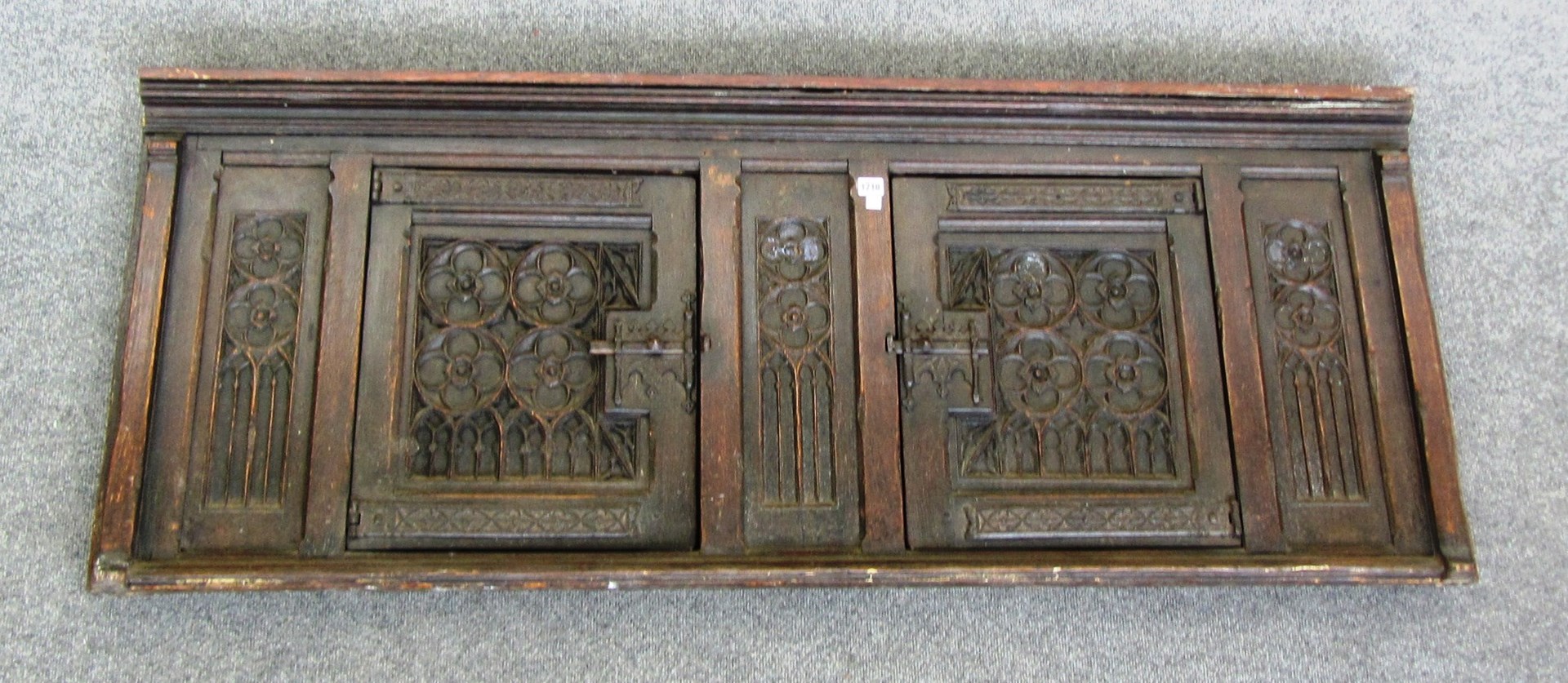 Appraisal: A th century style livery cupboard front mounted with five