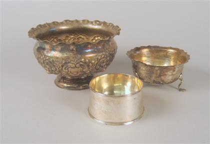 Appraisal: Three English sterling silver bowls Comprising a repousse decorated center