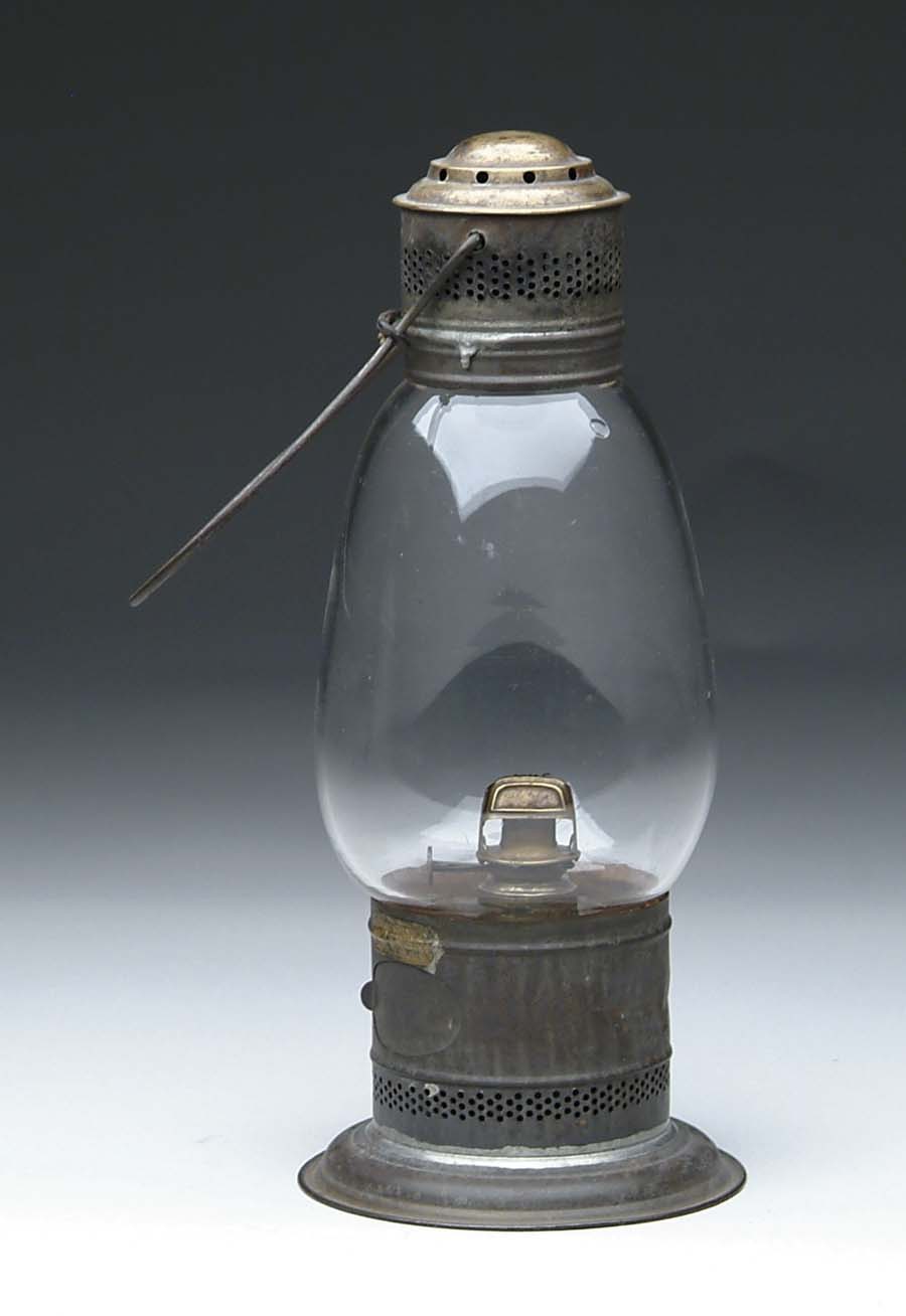 Appraisal: CIVIL WAR ERA OIL LAMP tall glass dome tin top