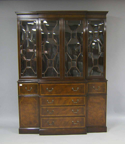 Appraisal: Baker mahogany breakfront with fitted desk drawer h w Provenance