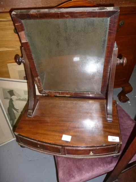 Appraisal: A TH CENTURY MAHOGANY TOILET MIRROR with a rectangular mirror