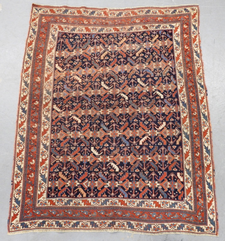 Appraisal: KAZAK BOTANICAL RUG Caucuses th CenturyRed white and blue geometric