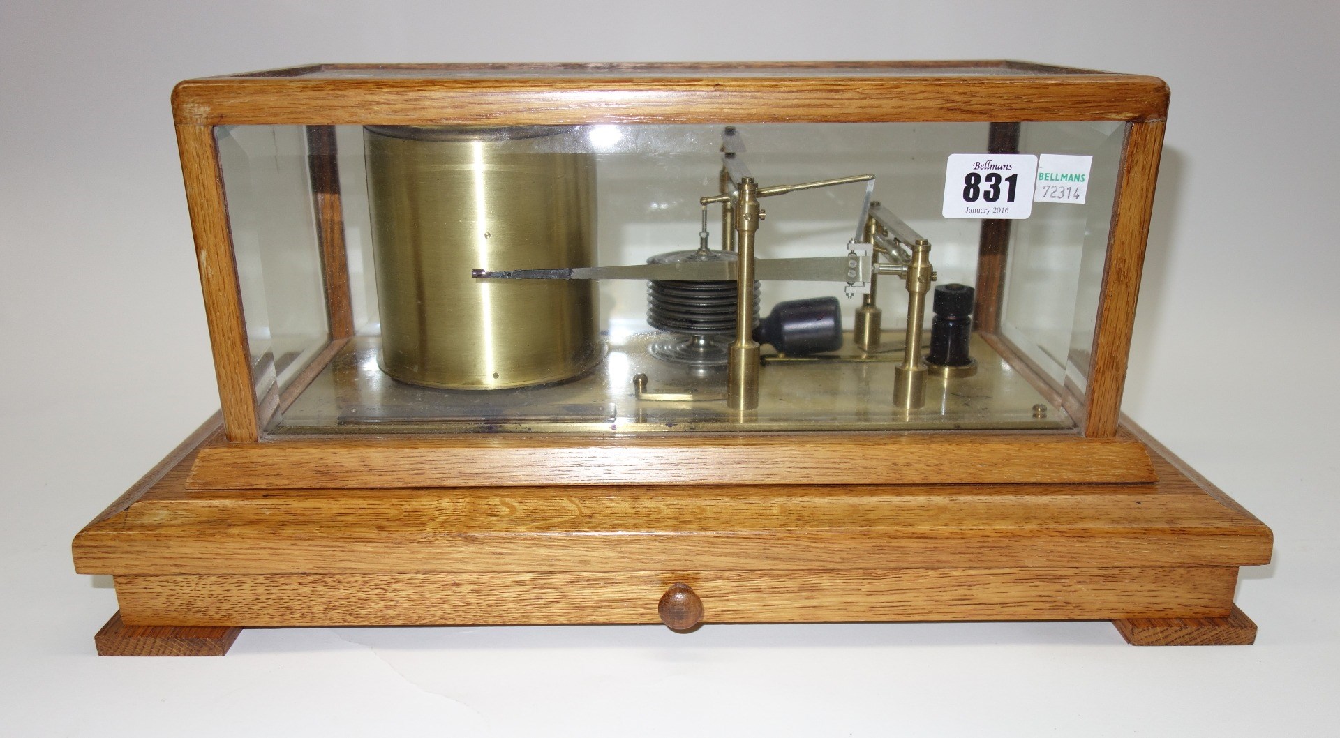 Appraisal: An oak cased barograph by Negretti and Zambra early th