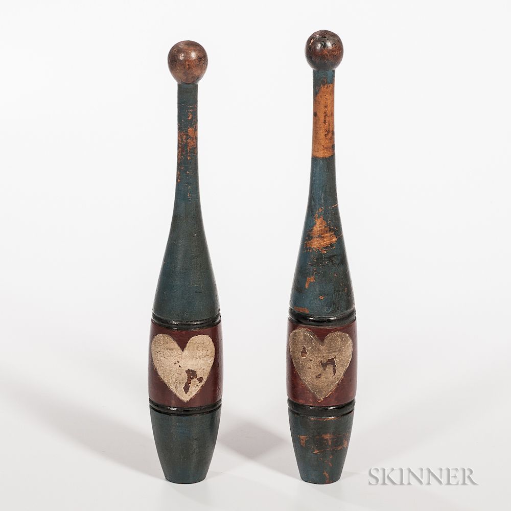 Appraisal: Pair of Polychrome Painted Juggling Clubs Pair of Polychrome Painted