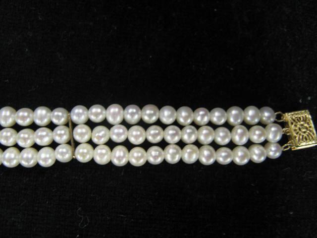 Appraisal: Pearl Bracelet triple strand k yellow gold filigree clasp