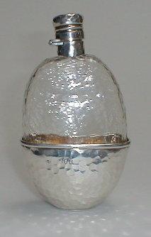 Appraisal: A late Victorian glass and silver mounted hip flask with