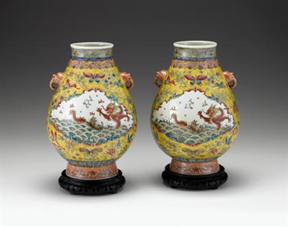 Appraisal: Large and impressive pair of Chinese enameled hu form vases