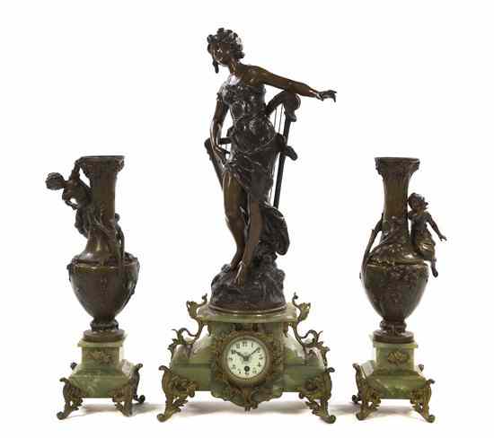 Appraisal: A French Cast Metal and Onyx Figural Clock Garniture after