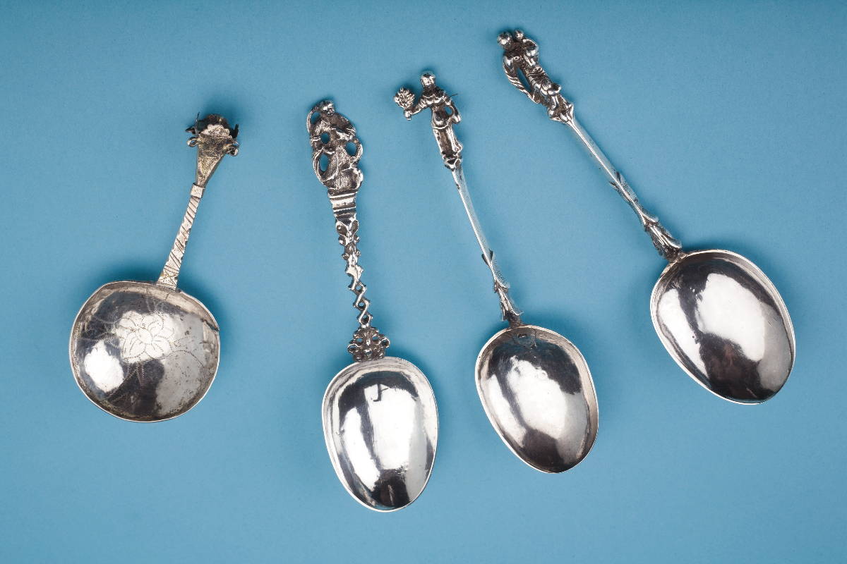 Appraisal: NORWEGIAN ENGRAVED SILVER SPOON AND THREE DUTCH SILVER SPOONS SEVENTEENTH-EIGHTEENTH