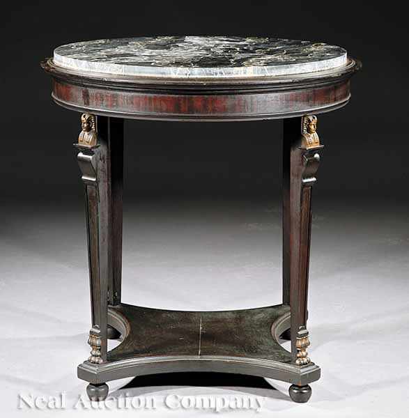 Appraisal: An Antique Regency-Style Mahogany and Gilt Metal-Mounted Gu ridon circular