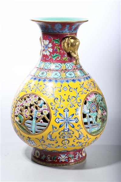 Appraisal: Chinese enameled porcelain cylinder vase with openwork floral design scrolling