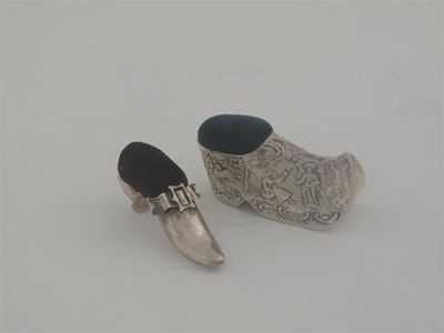 Appraisal: Two novelty shoe pin cushions a heeled example with a