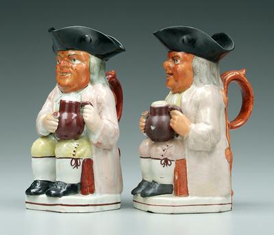 Appraisal: Two brown face Toby jugs brown speckled faces each holding