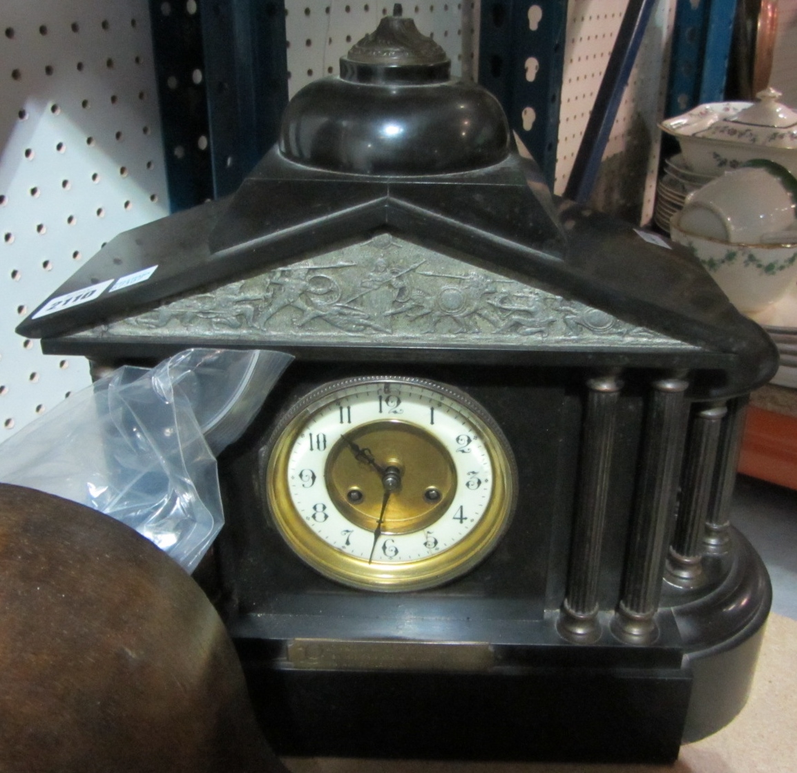 Appraisal: A slate cased mantel clock