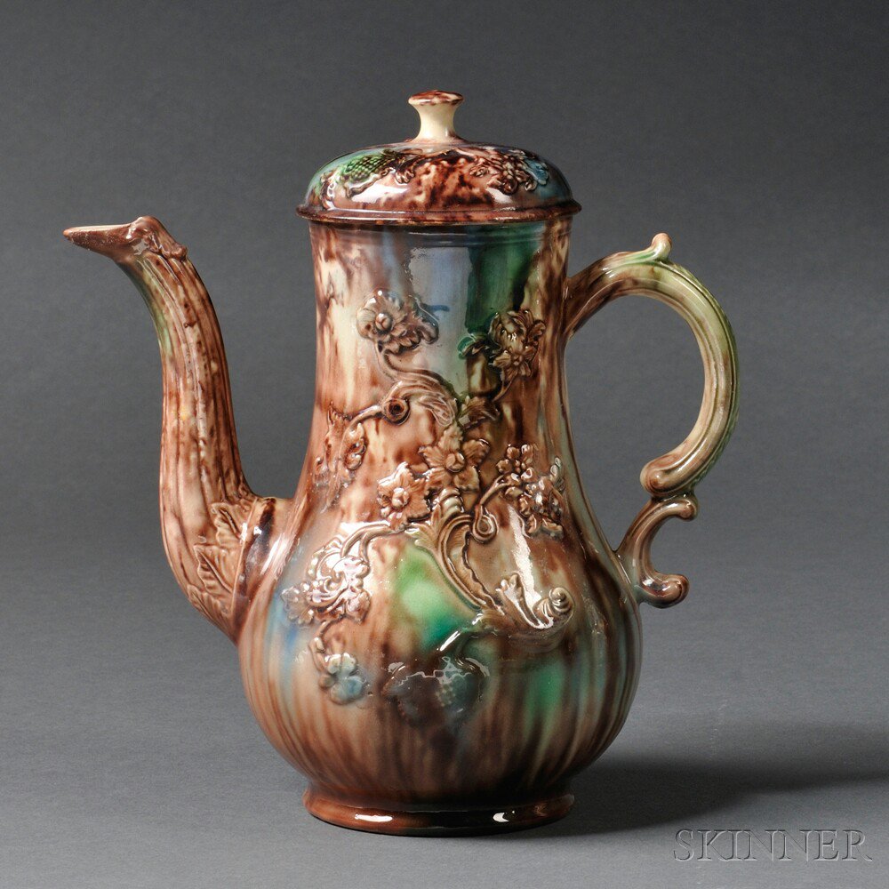 Appraisal: Staffordshire Cream-colored Earthenware Coffeepot and Cover England c elongated pear