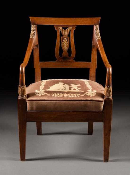 Appraisal: Italian Empire style carved fruitwood upholstered fauteuil th century with