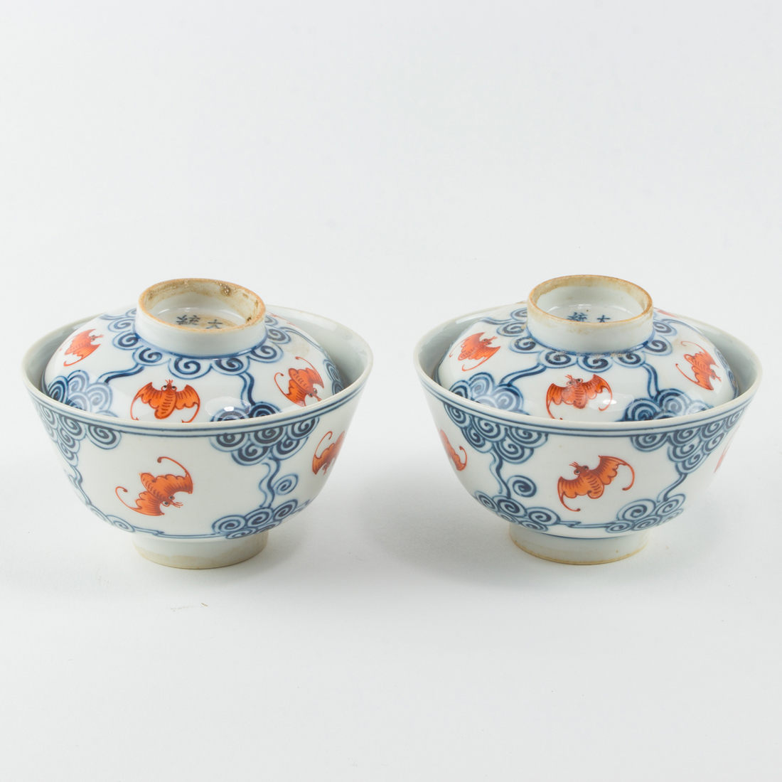 Appraisal: PAIR OF CHINESE BLUE AND WHITE LIDDED TEA BOWLS Pair