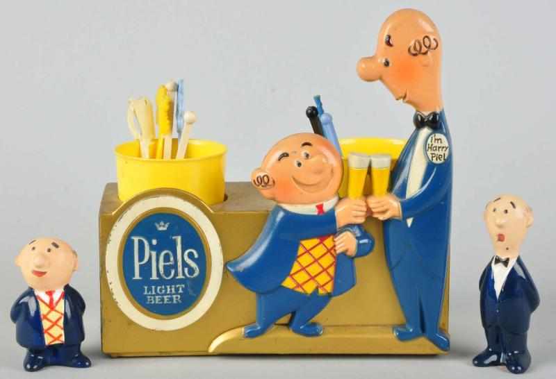 Appraisal: Lot of Piels Advertising Figures Includes ceramic salt and pepper