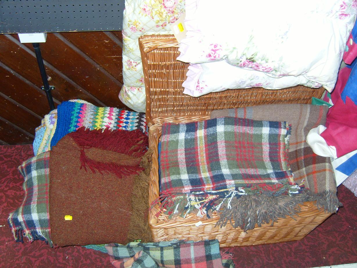 Appraisal: A wicker hamper containing a quantity of Welsh type blankets