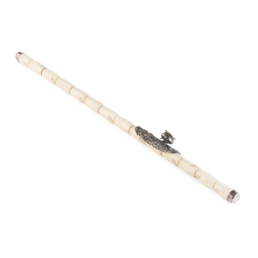 Appraisal: BONE OPIUM PIPE WITH WHITE METAL MOUNTS with incised banding