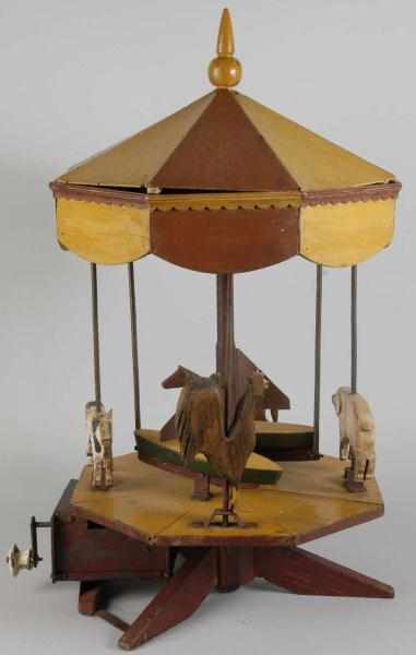 Appraisal: Wooden Folk Art Animal Carousel Description Circa s to s