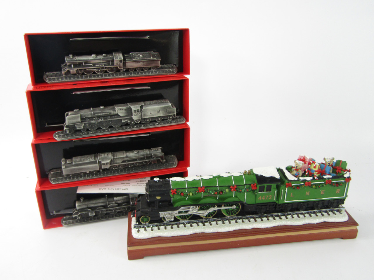 Appraisal: Four Great British Locomotives Heritage Collection pewter models comprising City