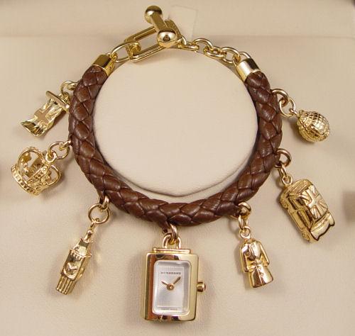 Appraisal: BURBERRY WATCH CHARM BRACELET New in the presentation box with