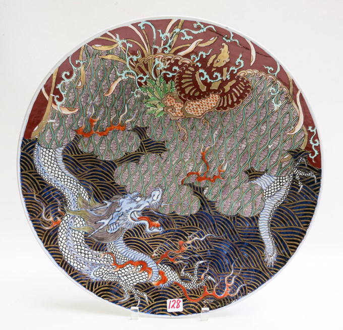 Appraisal: JAPANESE IMARI PORCELAIN CHARGER featuring a blue underglaze and polychrome