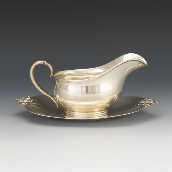 Appraisal: INTERNATIONAL SILVER ROYAL DANISH STERLING GRAVY BOAT AND UNDERPLATE International